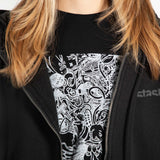 Model wearing the black Stash Mix t-shirt under a Stash hoodie