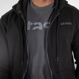 Front view of a model wearing the Stash Mix Hoodie over a Stash logo T-shirt