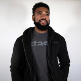 Model wearing grey Stash Watermark t-shirt under Stash Hoodie