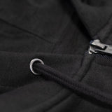 Close up detail of the Stash Mix Hoodie showing metal draw string grommet