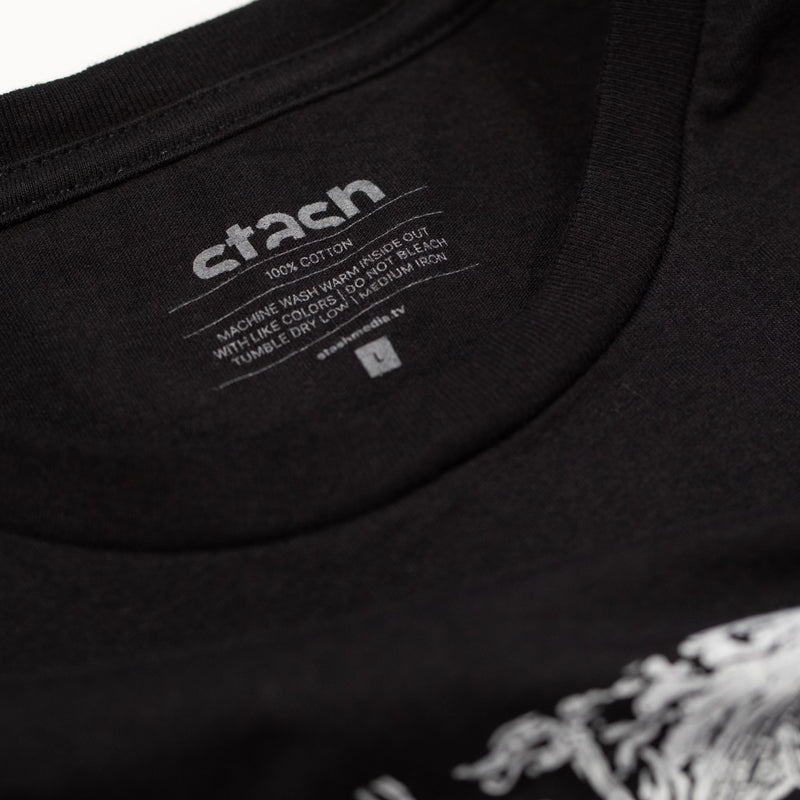 Close up of neck label on the black Stash Mix t-shirt 